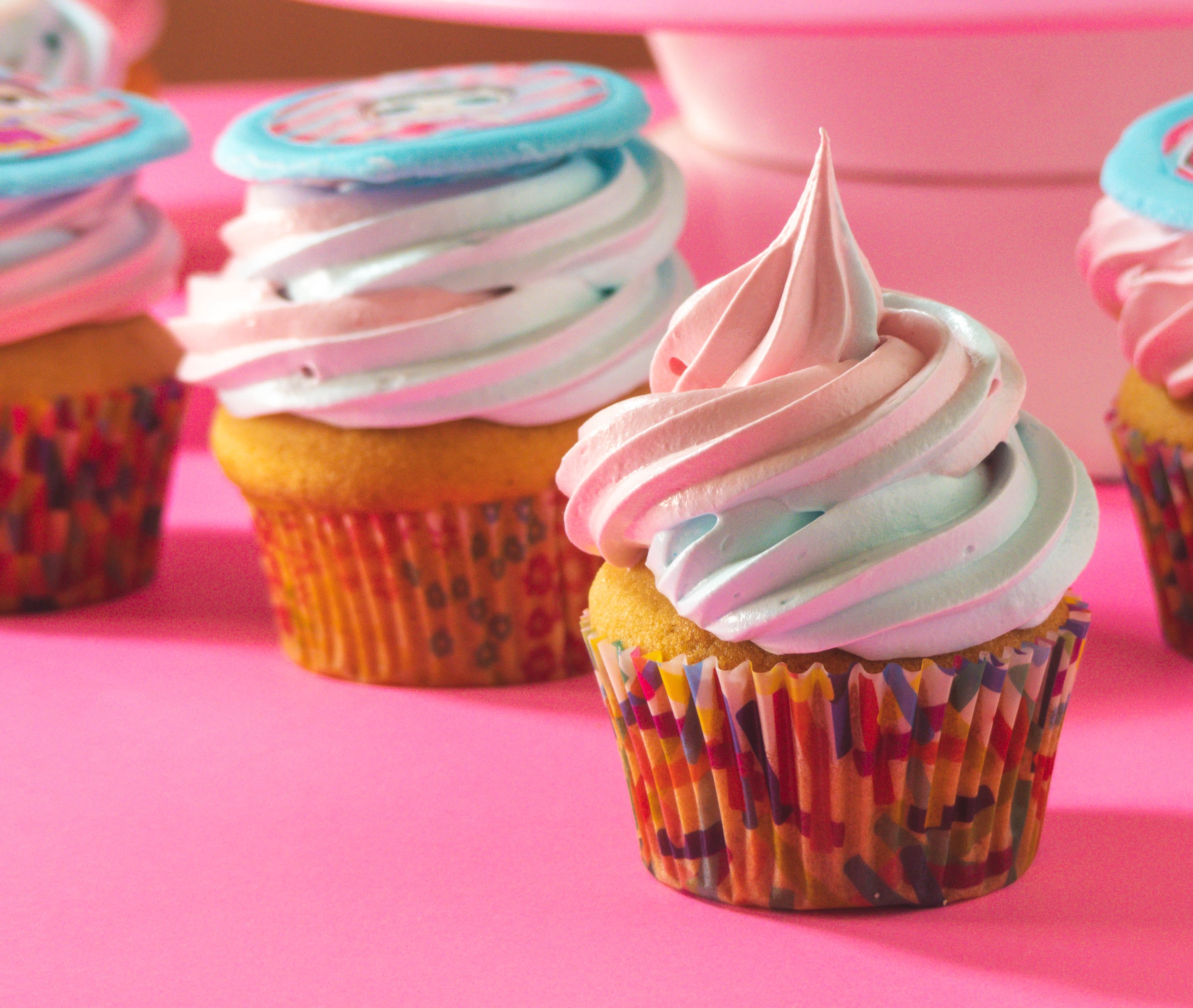 pretty cupcakes with pastel coloured icing on top